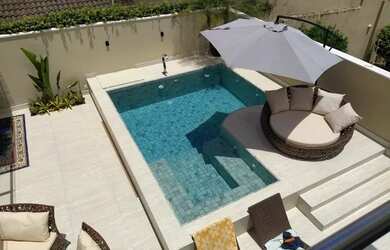 Imagem: A casa em condomínio possui 4 Dormitórios, 5 Banheiros, 4