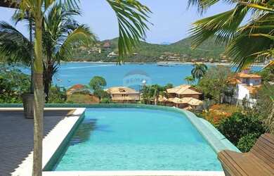 Imagem: A casa possui 5 Dormitórios, 5 Banheiros, 5 Vagas na garagem