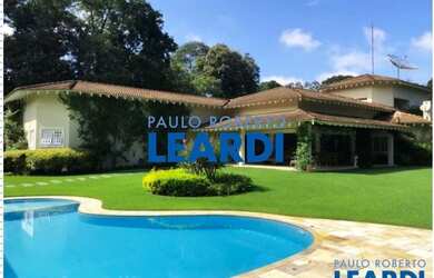 Imagem: A casa em condomínio possui 4 Dormitórios, 4 Banheiros, 2