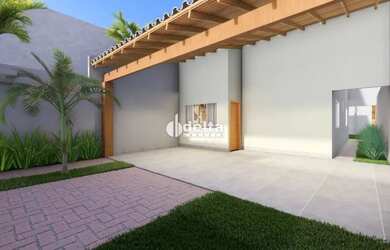 Imagem: A casa possui 3 Dormitórios, 2 Banheiros, 3 Vagas na garagem