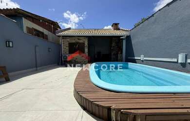 Imagem: A casa possui 3 Dormitórios, 1 Banheiro, 1 Vaga na garagem