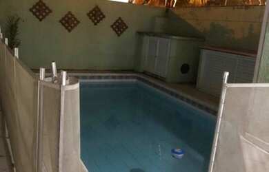 Imagem: A casa em condomínio possui 4 Dormitórios, 5 Banheiros, 2