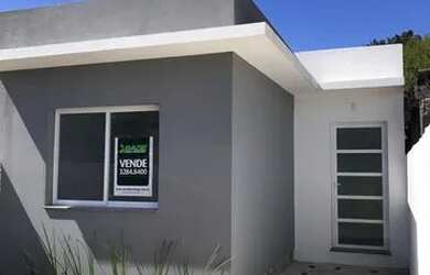 Imagem: A casa possui 2 Dormitórios, 1 Banheiro, 2 Vagas na garagem