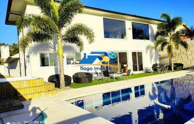 Imagem: A casa em condomínio possui 5 Dormitórios, 5 Banheiros, 5