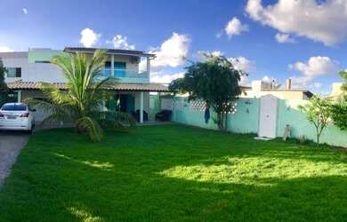 Imagem: A casa possui 4 Dormitórios e 5 Vagas na garagem e está localizado