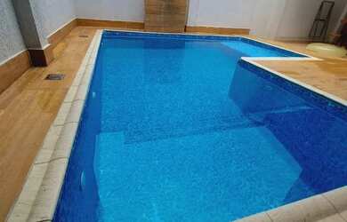 Imagem: A casa à venda possui 3 Dormitórios, 4 Banheiros e 2 Vagas