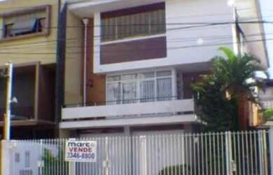 Imagem: A casa possui 3 Dormitórios, 1 Banheiro, 4 Vagas na garagem