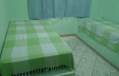 Imagem: A casa possui 5 Dormitórios, 3 Vagas na garagem e está localizado