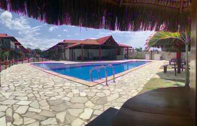 Imagem: A casa em condomínio possui 3 Dormitórios, 3 Banheiros, 3