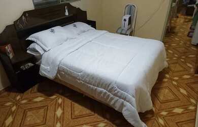 Imagem: A casa possui 2 Dormitórios, 2 Banheiros, 3 Vagas na garagem