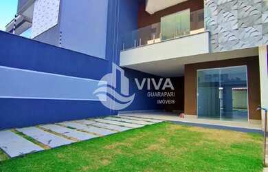 Imagem: A casa possui 3 Dormitórios, 3 Banheiros, 3 Vagas na garagem