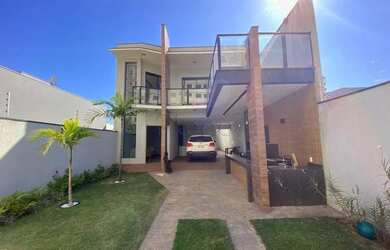 Imagem: A casa possui 3 Dormitórios, 4 Banheiros, 4 Vagas na garagem