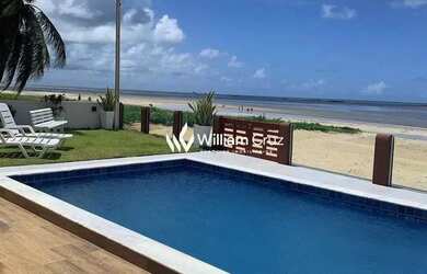 Imagem: A casa possui 3 Dormitórios, 5 Banheiros, 4 Vagas na garagem