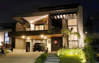 Imagem: A casa em condomínio possui 4 Dormitórios, 4 Banheiros, 4