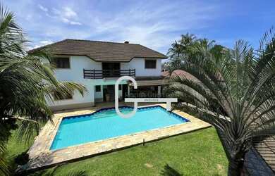 Imagem: A casa em condomínio possui 5 Dormitórios, 5 Banheiros, 1