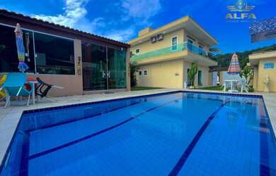 Imagem: A casa em condomínio possui 5 Dormitórios, 5 Banheiros, 3