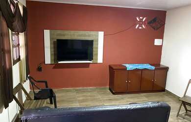 Imagem: A casa possui 3 Dormitórios, 3 Vagas na garagem e está localizado