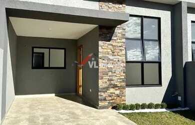 Imagem: A casa possui 3 Dormitórios, 1 Banheiro, 2 Vagas na garagem