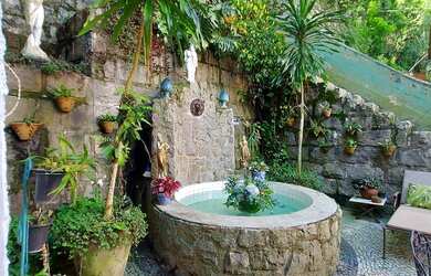 Imagem: A casa possui 5 Dormitórios, 5 Banheiros, 3 Vagas na garagem