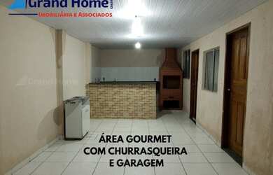 Imagem: A casa possui 3 Dormitórios, 1 Banheiro, 2 Vagas na garagem