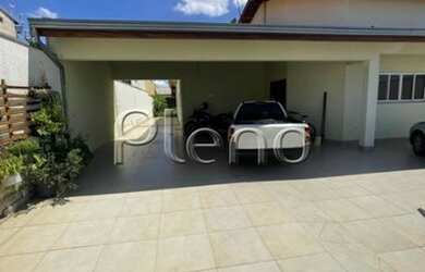 Imagem: A casa possui 4 Dormitórios, 4 Banheiros, 4 Vagas na garagem