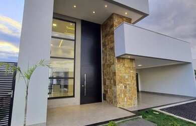 Imagem: A casa e possui 3 Dormitórios, 4 Banheiros, 3 Vagas na garagem