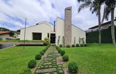 Imagem: A casa em condomínio possui 3 Dormitórios, 5 Banheiros, 4