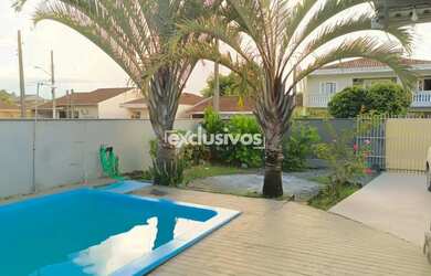 Imagem: A casa possui 3 Dormitórios, 1 Banheiro, 1 Vaga na garagem