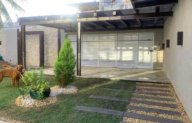 Imagem: A casa possui 4 Dormitórios, 5 Banheiros, 2 Vagas na garagem