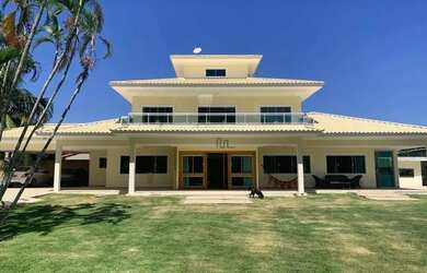 Imagem: A casa possui 5 Dormitórios, 5 Banheiros, 5 Vagas na garagem