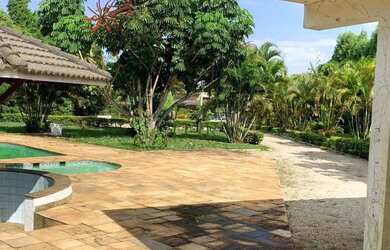 Imagem: A casa em condomínio possui 4 Dormitórios, 1 Banheiro, 5 Vagas