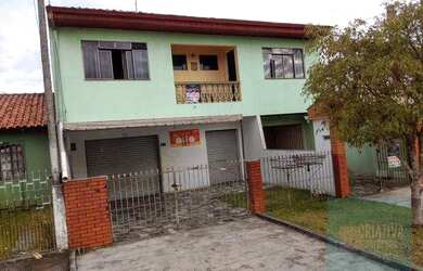 Imagem: A casa possui 3 Dormitórios, 2 Banheiros, 3 Vagas na garagem