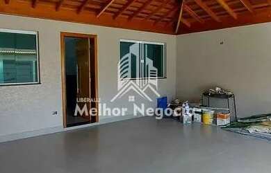 Imagem: A casa possui 3 Dormitórios, 2 Banheiros, 3 Vagas na garagem