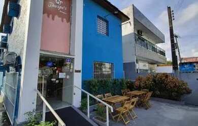 Imagem: A casa possui 4 Dormitórios, 3 Banheiros, 4 Vagas na garagem