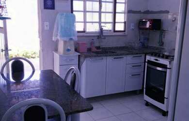 Imagem: A casa possui 3 Dormitórios, 2 Banheiros, 5 Vagas na garagem