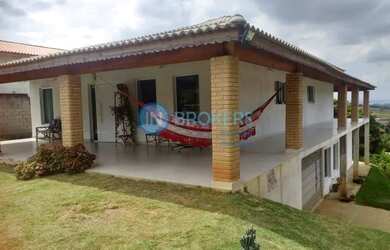 Imagem: A casa possui 4 Dormitórios, 4 Banheiros, 4 Vagas na garagem