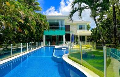 Imagem: A casa em condomínio possui 4 Dormitórios, 5 Banheiros, 5