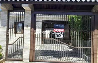 Imagem: A casa possui 5 Dormitórios, 3 Banheiros, 3 Vagas na garagem