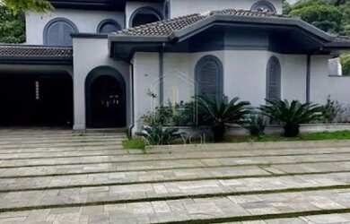 Imagem: A casa em condomínio possui 5 Dormitórios, 5 Banheiros, 5