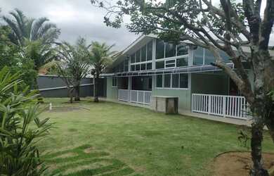 Imagem: A casa possui 3 Dormitórios, 3 Banheiros, 3 Vagas na garagem