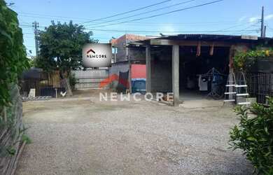 Imagem: A casa possui 5 Dormitórios, 4 Banheiros, 2 Vagas na garagem