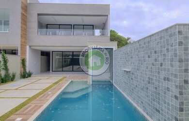 Imagem: A casa em condomínio possui 4 Dormitórios, 5 Banheiros, 2