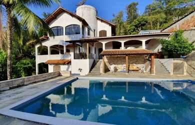 Imagem: A casa em condomínio possui 5 Dormitórios, 5 Banheiros, 5