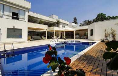 Imagem: A casa em condomínio possui 5 Dormitórios, 5 Banheiros, 5