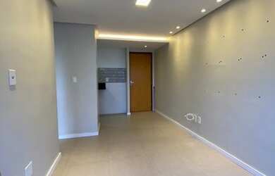 Imagem: O apartamento possui 1 Dormitório, 1 Banheiro, 1 Vaga na garagem