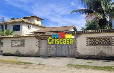 Imagem: A casa possui 2 Dormitórios, 2 Banheiros, 3 Vagas na garagem