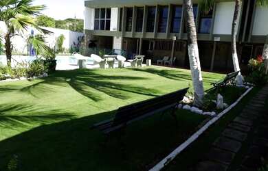 Imagem: A casa possui 5 Dormitórios, 5 Vagas na garagem e está localizado