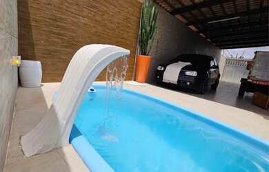 Imagem: A casa possui 5 Dormitórios, 5 Banheiros, 5 Vagas na garagem