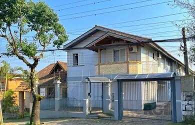 Imagem: A casa em condomínio possui 3 Dormitórios, 2 Banheiros, 1