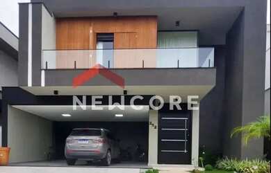 Imagem: A casa possui 3 Dormitórios, 5 Banheiros, 2 Vagas na garagem